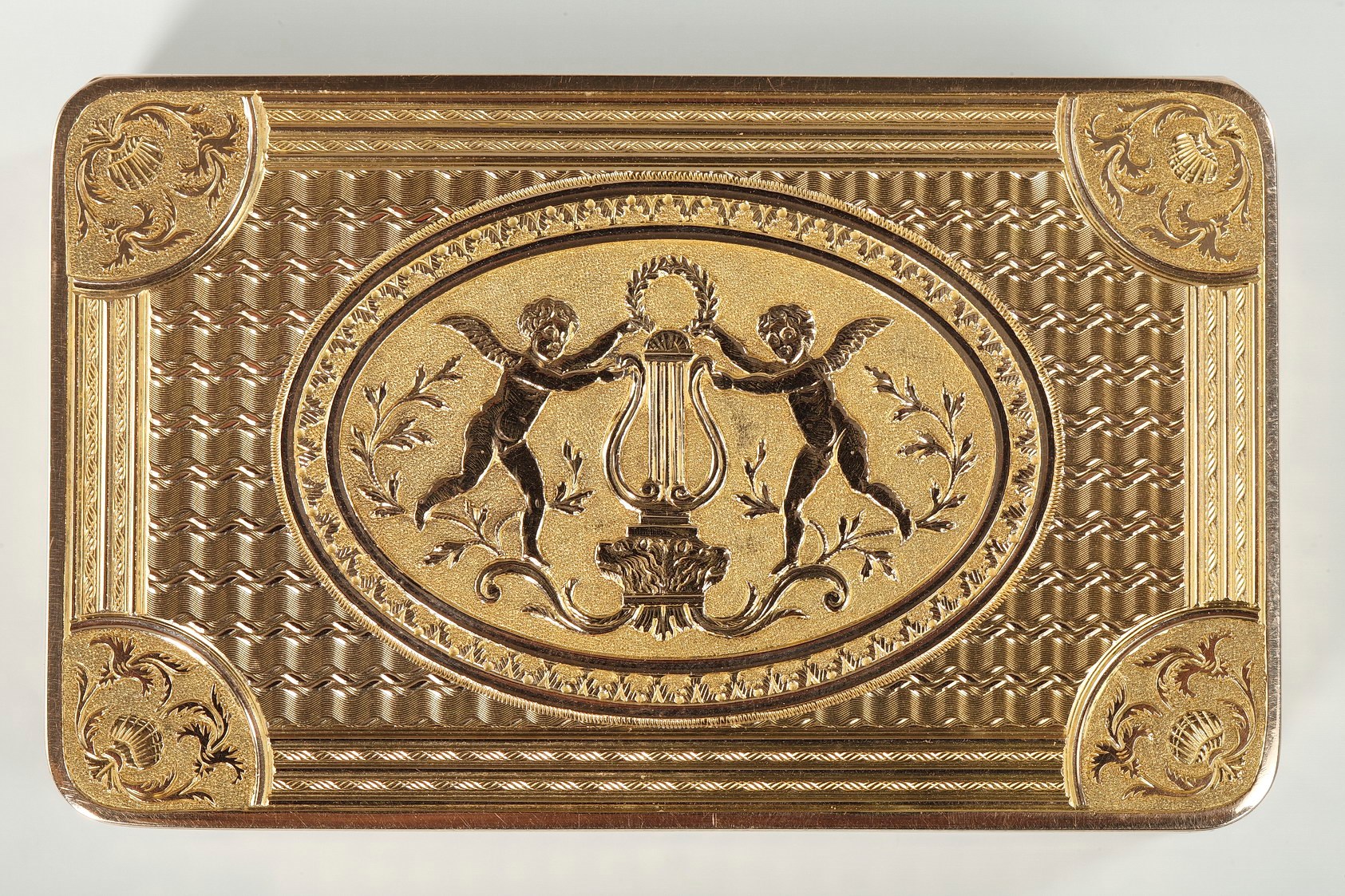 An Early 19th Century GOLD MUSICAL SNUFF BOX